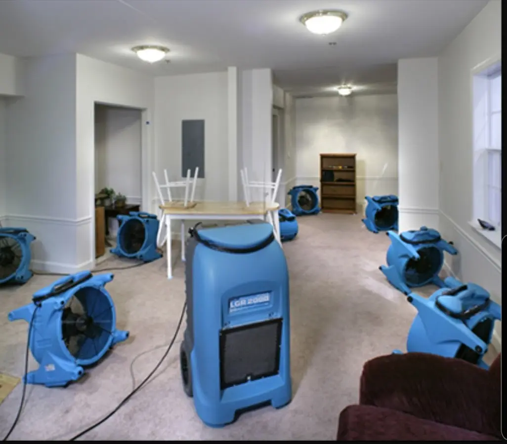 Air movers and dehumidifier setup for Water Damage Restoration in Unity